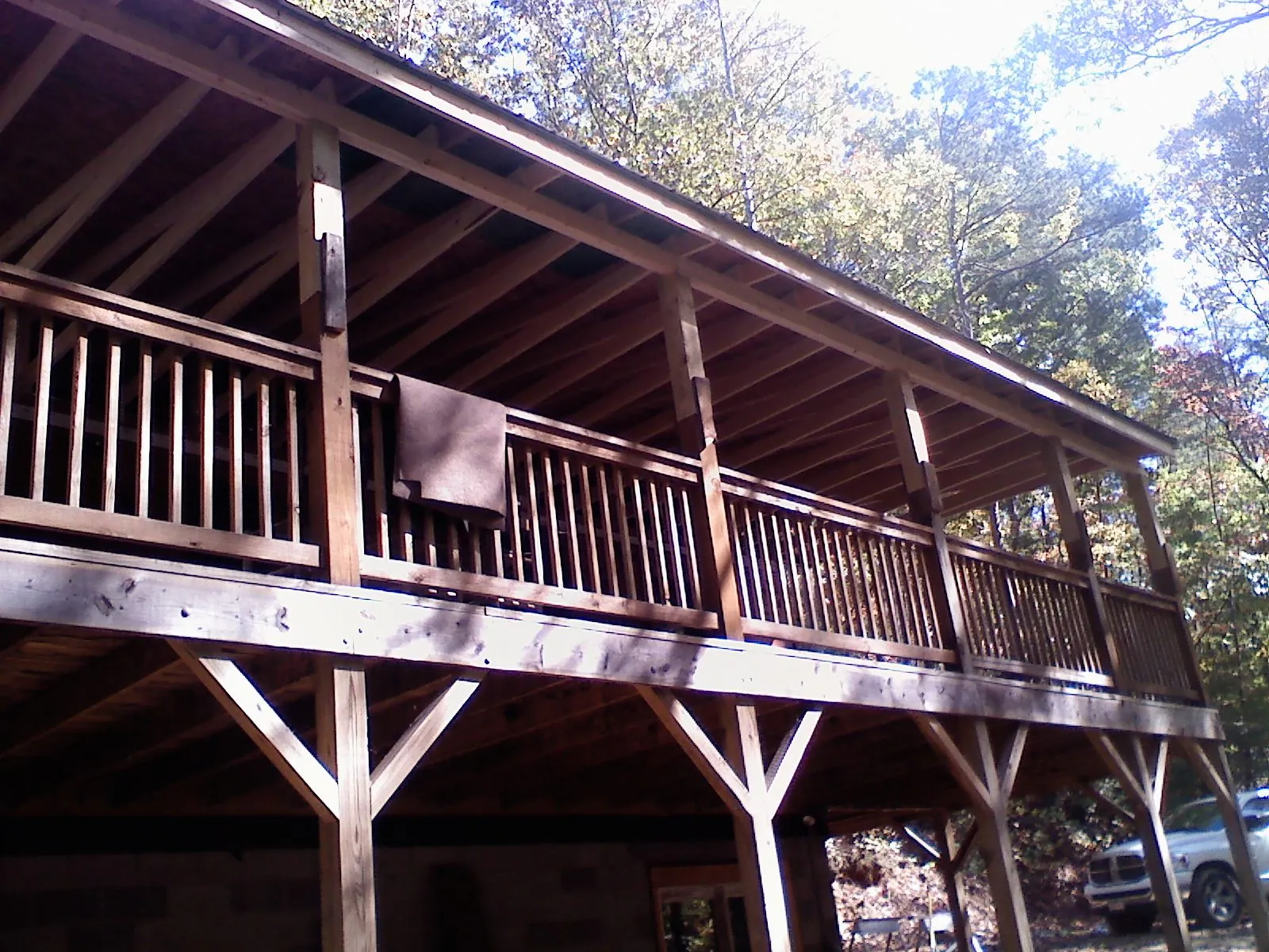 Timber framing under a new elevated porch and deck — Roof Leak Repair in Oyster Bay by Roofing Brothers